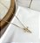 Colar RIANE cruz com navete rose folheada a ouro - Imagem 1