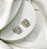 Brinco DONA M quadrado cravejada com zirconia navete folheada a ouro - Imagem 1