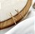 Brinco TURQUIA X cravejada com micro zirconias folheada a ouro - Imagem 1