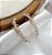 Brinco ARLETE ear cuff cravejado com zircônias navete folheada a ouro - Imagem 1