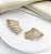 Brinco VELMA ear hook cravejado com microzirconias folheada a ouro - Imagem 1
