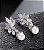 Brinco BESKA com flor de zirconia e pérola - Imagem 2