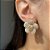Brinco Flower Cravejada Banhado a Ouro - Imagem 4