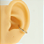 Segmento Cravejado Envolve | Tit. PVD Gold | Piercing de Orelha - Imagem 2
