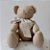 Urso Médio Articulado de Pano Bege – Em Algodão com Rostinho Bordado à Mão - Imagem 2
