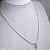 CHOCKER DOURADA CORDÃO BAIANO FINO COM PINGENTE DE CORAÇÃO CRAVEJADO - Imagem 3