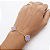 PULSEIRA DOURADA COM TREVOS DE PEDRAS LILÁS - Imagem 2