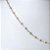 CHOCKER DOURADA DE BOLINHAS JUNTINHAS E FINAS 40CM - Imagem 2