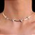 CHOCKER DOURADA FITA COM QUATRO CORAÇÕES CRAVEJADOS - 30CM + EXTENSOR - Imagem 1