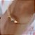 PULSEIRA DOURADA CORDA DE VIOLÃO COM BOLINHAS E TRES CORAÇÕES MAIORES DE TRÊS BANHOS - FECHO IMÃ - Imagem 4