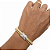 BRACELETE DOURADO ESPIRAL COM PINGETE DE X TODO CRAVEJADO EM RODIO BRANCO - Imagem 2