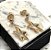 Brinco estrela 3D banhado ouro - Imagem 2