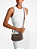 Bolsa Transversal Carmela Signature Logo Pequena cor Brown Michael Kors - Imagem 3