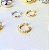 Piercing cravejado com zirconias - Imagem 1