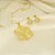 Conjunto com Flor Trabalhada Banhado a Ouro 18k - Imagem 1