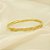 Bracelete com Design Torcido Cravejado e Banhado a Ouro 18k - Imagem 2