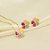 Conjunto de Flor Resinada Banhado a Ouro 18k - Imagem 1