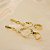 Brinco com Design Torcido Banhado a Ouro 18k - Imagem 1