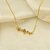 Gargantilha Flor com Detalhes de Zircônia Banhado a Ouro 18k - Imagem 1