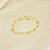 Pulseira de Flores e Bolinhas Banhado a Ouro 18k - Imagem 1