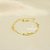 Pulseira de Elo Chapeado com Flores Banhado a Ouro 18k - Imagem 1