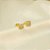Brinco de Flor Cravejado com Zircônia Banhado a Ouro 18k - Imagem 1