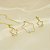 Conjunto Flor Vazada com Detalhe Zircônia Banhado a Ouro 18k - Imagem 1
