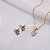 Conjunto do Stitch Resinado e Banhado a Ouro 18k - Imagem 1