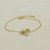Pulseira de Quatro Pétalas  Cravejada com Zircônias Cristal Banhado a Ouro 18k - Imagem 1