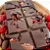 Chocolate Meio Amargo Com Cereja e Amêndoas - Imagem 1