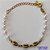 PULSEIRA NO BRUTO PRONTO PARA O BANHO(CX66) - PULSEIRA INFANTIL COM PÉROLAS E CONCHAS - TAMANHO 13CM + EXTENSOR - PESO 2,4GR - FECHO REDONDO - BRU10191 - Imagem 1