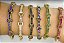 PULSEIRA (BRACELETE) NO BRUTO PRONTO PARA O BANHO(CX114) - COM DETALHES VAZADOS E CRAVEJADA COM MICROS ZIRCÔNIAS AZUL - PESO TOTAL 12,2GR - BRU10576 - Imagem 3