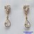 BRINCO FOLHEADO A OURO - BANHADO COM 5 MILÉSIMOS + VERNIZ DIAMOND - BRINCO DE PINO COM ZIRCÔNIA CORAÇÃO CRISTAL  E PINGENTE ZIRCÔNIA TIPO GOTA  - TAMANHO 22MM - OURO030 - Imagem 1