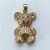PINGENTE NO BRUTO PRONTO PARA O BANHO(TTUU) (CX03) - PINGENTE URSO CRAVEJADO EM MICROS ZIRCÔNIAS E COM OLHOS VERMELHOS - COMPOSIÇÃO: LATÃO / ZIRCÔNIA  - TAMANHO 15X24MM - PESO TOTAL 3,6GR - BRU12688 - Imagem 1
