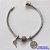 PULSEIRA EM AÇO INOXIDÁVEL(CX35)- PULSEIRA TIPO PANDORA COM FECHO REDONDO E COM BERLOQUE RAQUETE BEACH TENNIS, BERLOQUE ÁRVORE DA VIDA E BERLOQUE REDONDO COM CORAÇÕES - TAMANHO 20CM - COMPOSIÇÃO: AÇO INOXIDÁVEL - AÇO1152 - Imagem 1