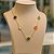 GARGANTILHA EM AÇO INOXIDÁVEL(CX55) - GARGANTILHA EM AÇO INOXIDÁVEL DOURADO COM PINGENTES TIPO VAN CLEEF COLORIDOS COM ZIRCÔNIA 13MM - TAMANHO: 45CM + EXTENSOR - FECHO LAGOSTA - COMPOSIÇÃO: AÇO INOXIDÁVEL - GARANTIA 06 MESES - AÇO1256 - Imagem 2