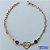 PULSEIRA PRONTO PARA O BANHO(CX96) - PULSEIRA COM CORAÇÃO LOVE E PEDRAS CRISTAIS AZUÍS TAMANHO 19CM - PESO TOTAL 2,1GR - BRU13652 - Imagem 1