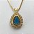 CONJUNTO FOLHEADO A OURO(CJB243) - BANHADO COM 5 MILÉSIMOS + VERNIZ DIAMOND - CONJUNTO COM CORRENTE VENEZIANA 45CM E BRINCOS DE PINO CRAVEJADO COM MICRO ZIRCÔNIAS E ZIRCÔNIA AZUL 10MM- OURO262 - Imagem 2