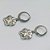 BRINCO EM AÇO INOXIDÁVEL *CX101- BRINCOS ARGOLAS DE PRESSÃO COM PINGENTE PATINHA 12X13MM - COMPOSIÇÃO: AÇO INOXIDÁVEL - AÇO1738 - Imagem 2