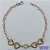 PULSEIRA NO BRUTO PRONTO PARA O BANHO(CX110) - PULSEIRA COM CORAÇÕES VAZADOS E STRASS CRISTAL 18CM + EXTENSOR - COMPOSIÇÃO 100% LATÃO - PESO: 2,4GR  BRU14092 - Imagem 1