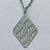 CONJUNTO EM AÇO INOXIDÁVEL(CX109) - (AÇO03) GARGANTILHA COM CORRENTE 50CM E PINGENTE VAZADOS 25X15MM E BRINCO ARGOLA DE PRESSÃO COM PINGENTE VAZADOS - COMPOSIÇÃO: AÇO INOXIDÁVEL - AÇO1841 - Imagem 2