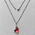 GARGANTILHA EM AÇO INOXIDÁVEL - (AÇO03) (CX.116)  GARGANTILHA COM CORRENTE 50CM E PINGENTE CORAÇÃO EM CRISTAL ROSA / LARANJA 15MM - COMPOSIÇÃO: AÇO INOXIDÁVEL - AÇO1922 - Imagem 1