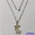 GARGANTILHA EM AÇO INOXIDÁVEL - (12753) -(CX.60)  GARGANTILHA COM CORRENTE 60CM E PINGENTE CRUCIFIXO AMÉM 18X34MM - COMPOSIÇÃO: AÇO INOXIDÁVEL - AÇO2011 - Imagem 1