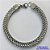 PULSEIRA EM AÇO INOXIDÁVEL - (CX.55)  LARGURA 7MM  TAMANHO 18CM - - FECHO LAGOSTA - COMPOSIÇÃO: AÇO INOXIDÁVEL -  AÇO2054 - Imagem 1