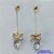 BRINCO FOLHEADO A OURO - BANHADO COM 5 MILÉSIMOS + VERNIZ DIAMOND - BRINCO DE PINO BOLINHA COM FIO E ZIRCÔNIAS 12MM - OURO351 - Imagem 1