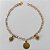 PULSEIRA NO BRUTO PRONTA PARA O BANHO -   (CX.07) PULSEIRA COM FLORES CRISTAIS E PINGENTE REDONDO TREVO  - TAMANHO 18CM - PESO TOTAL 2,2GR - BRU15269 - Imagem 1