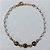 PULSEIRA NO BRUTO PRONTA PARA O BANHO - PULSEIRA EM PÉROLAS E OLHOS GREGOS NEGROS - TAMANHO 18CM + EXTENSOR - PESO 1,7GR- BRU24168 - Imagem 1