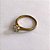 ANEL NO BRUTO PRONTO PARA O BANHO(cx111) - ANEL SOLITÁRIO CRAVEJADO COM MICROS ZIRCÔNIAS 7MM - PESO MÉDIO 1,7R - COMPOSIÇÃO: LATÃO / ZIRCÔNIA - ANEL000515 - Imagem 2