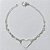 PULSEIRA FOLHEADA A PRATA COM 50 MILÉSIMOS + VERNIZ DIAMOND - PULSEIRA 17CM COM PÉROLAS E CORAÇÃO VAZADO - PRA893 - Imagem 1