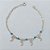 PULSEIRA FOLHEADA A PRATA COM 50 MILÉSIMOS + VERNIZ DIAMOND - PULSEIRA DUPLA 18CM COM LUAS E STRASS AZUIS - PRA919 - Imagem 1